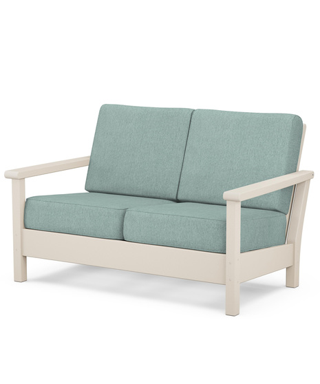 Haanrbour Deep Seating Loveseat is the perfect addition to your outdoor living area designed with contemporary lines and premium comfort