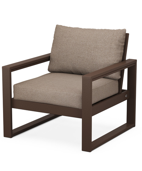 With sleek, angular lines, this modern deep seating chair features a plush pillow-back cushion as well as a supportive seat cushion covered in high-performance outdoor fabric.