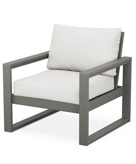 With sleek, angular lines, this modern deep seating chair features a plush pillow-back cushion as well as a supportive seat cushion covered in high-performance outdoor fabric.