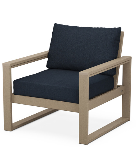 With sleek, angular lines, this modern deep seating chair features a plush pillow-back cushion as well as a supportive seat cushion covered in high-performance outdoor fabric.