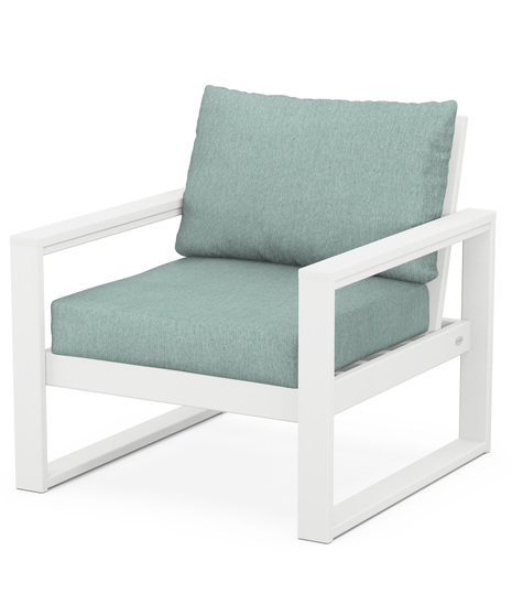 With sleek, angular lines, this modern deep seating chair features a plush pillow-back cushion as well as a supportive seat cushion covered in high-performance outdoor fabric.