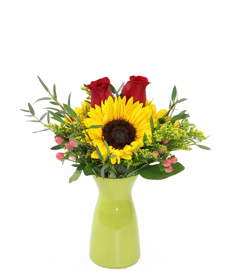 A cheerful arrangement designed to brighten anyone's day. A trio of sunflowers and accents in a bright vase are sure to spread happiness and joy.