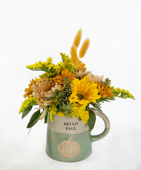 Two gifts in one! A bouquet featuring seasonal flowers in a ceramic mug Hello Fall mug.  A perfect gift to brighten someone's day.