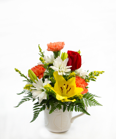 Two gifts in one! A bouquet featuring seasonal flowers in a ceramic mug Hello Fall mug.  A perfect gift to brighten someone's day.