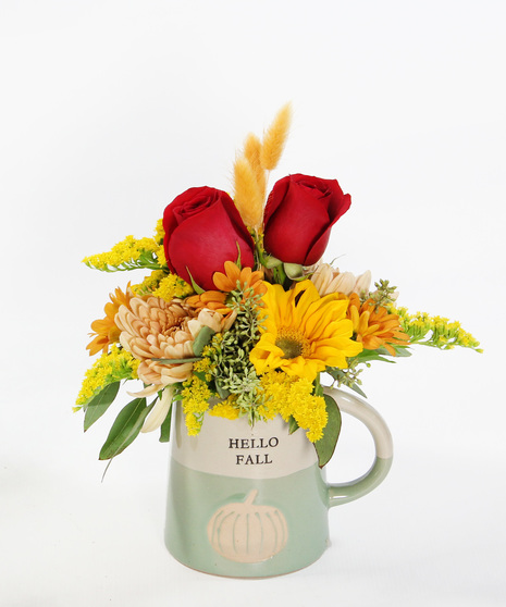 Two gifts in one! A bouquet featuring seasonal flowers in a ceramic mug Hello Fall mug.  A perfect gift to brighten someone's day.