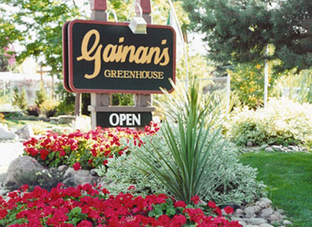 Lovely landscaping around the sign outside our shop - Open for Business